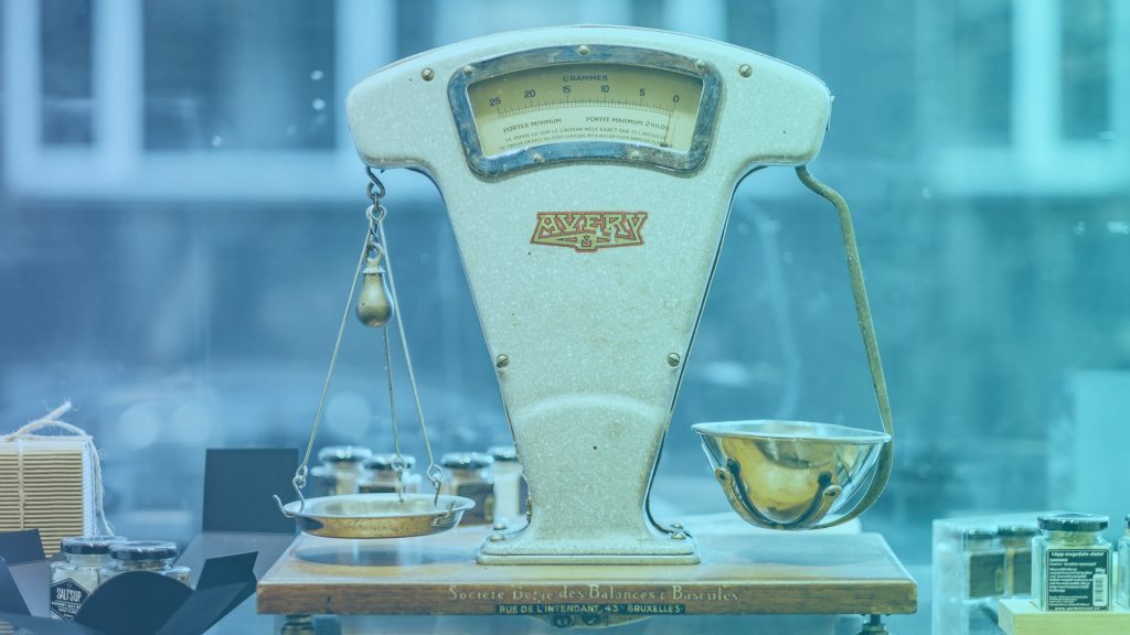 old style scales like you would get in a bakers. Representing the balancing of priorities when choosing the best intranet software for your business